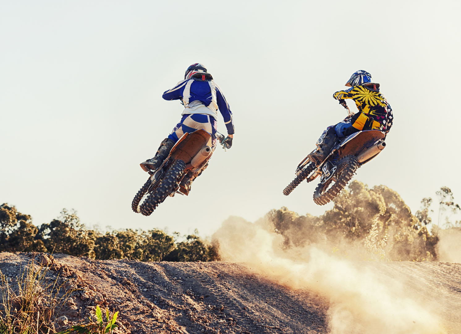 Sport, racer and dirtbike in action for competition on dirt road