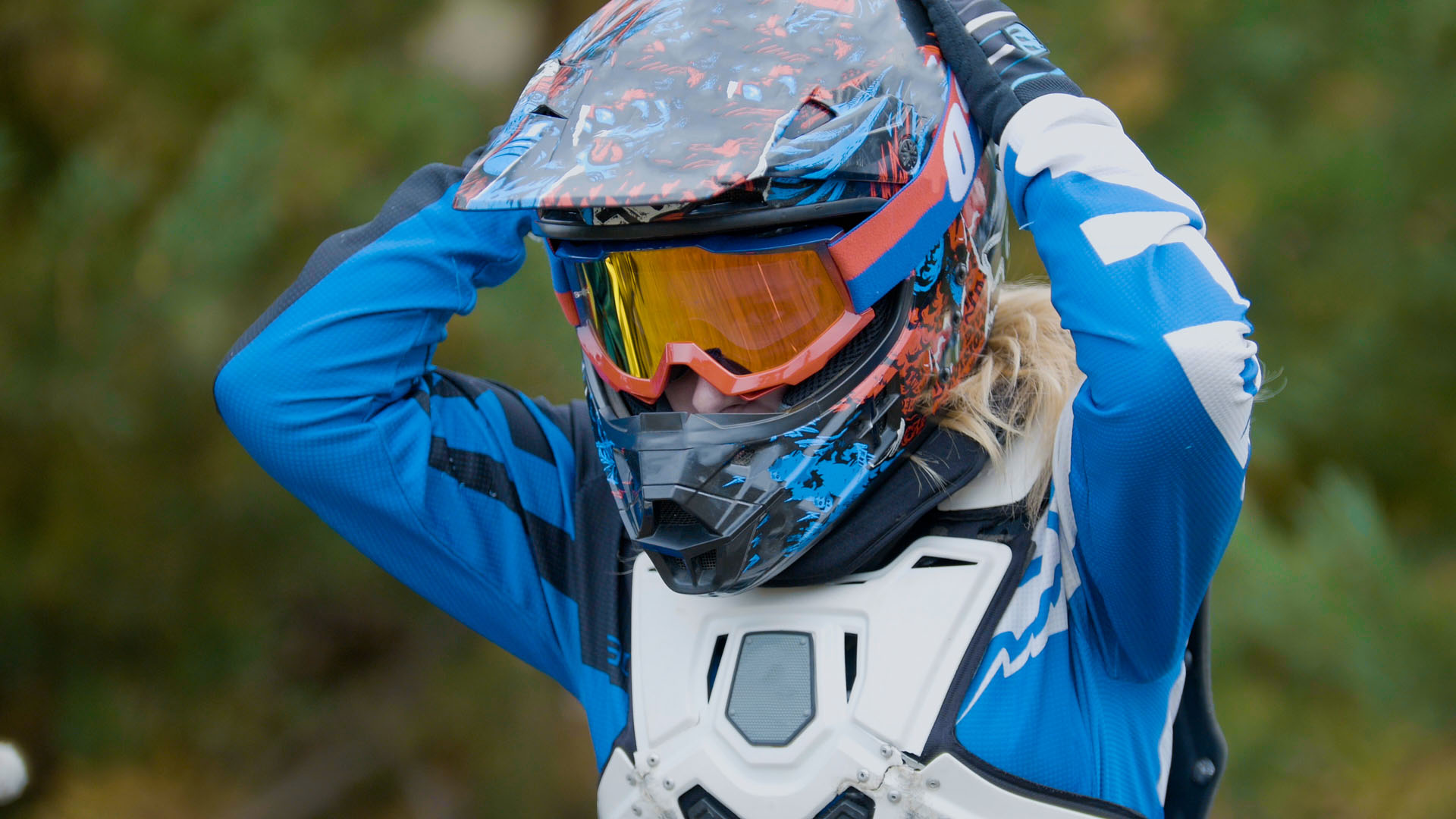 MX moto Girl in a helmet cross racing